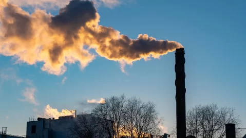 A smoking chimney in an industrial area
